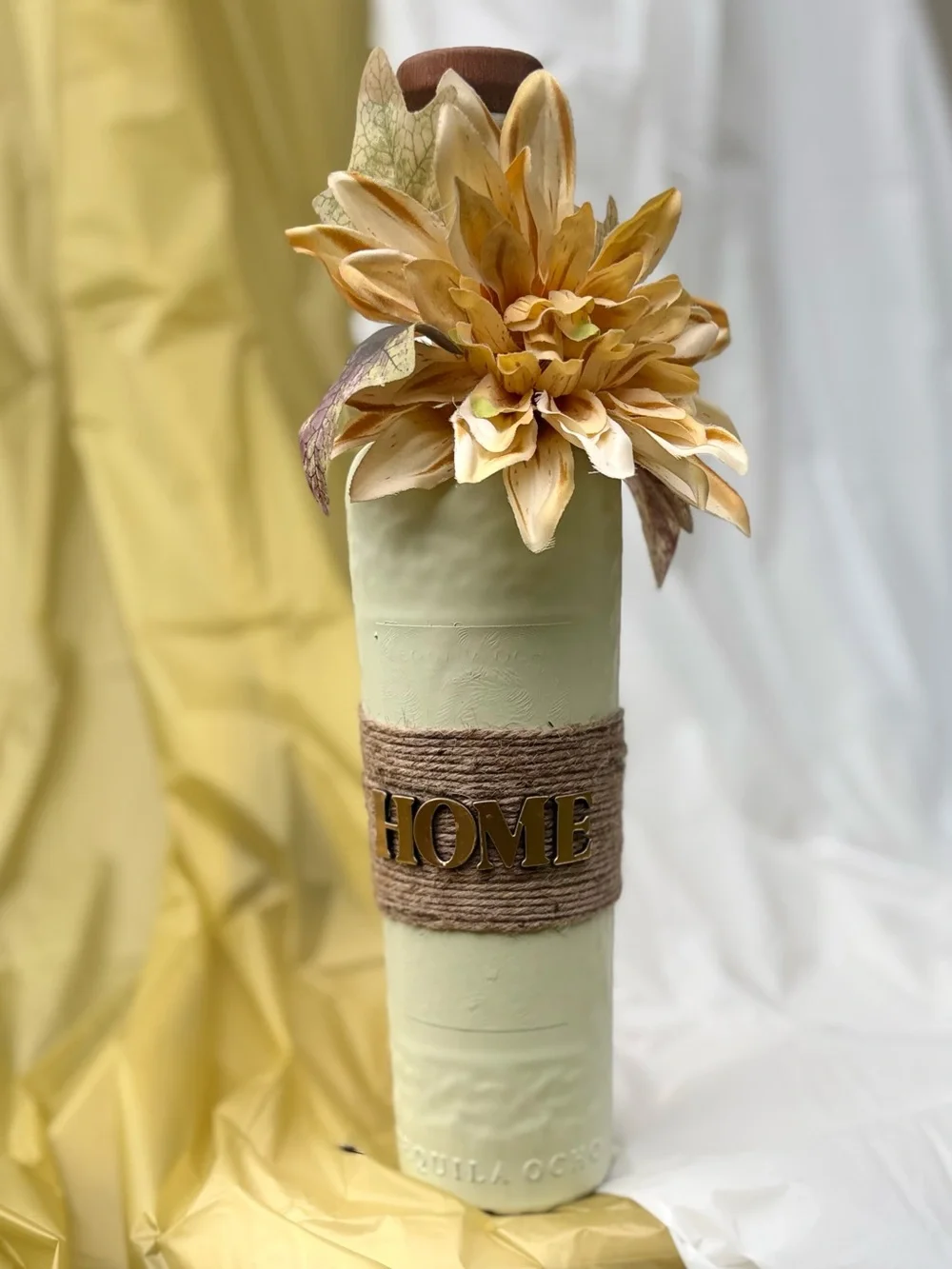 Neutral Green Decorative Vase with Yellow Flower Accent by